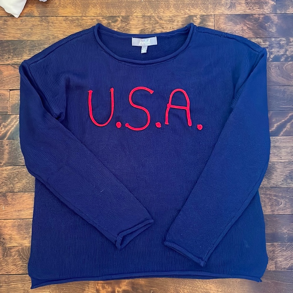 USA navy sweater with red crochet writing.
